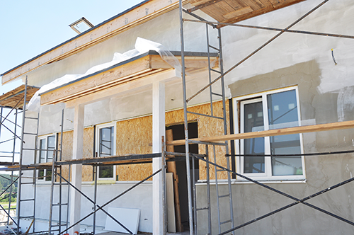 Scaffolding put up as new addition to a house is being made